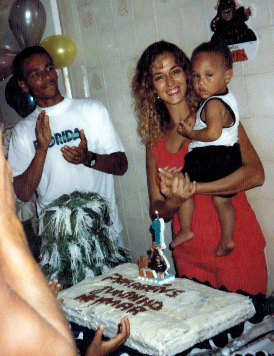  A baby Neymar is given a cake at his first birthday party