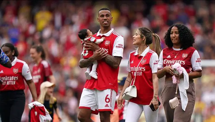 Gabriel Magalhaes with his wife and child on the football pitch. 