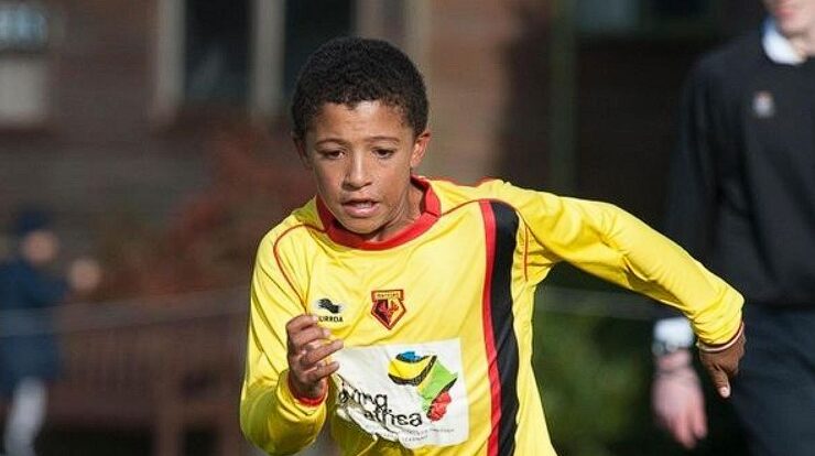 A Young Jadon Sancho playing football.