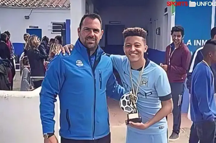 Jadon Sancho with his dad. 